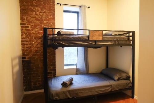 Postel nebo postele na pokoji v ubytování Family Friendly 4BR 2BA in Prime NYC Location
