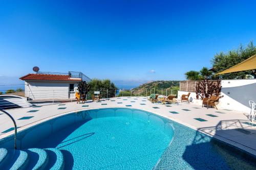 a swimming pool with a view of the ocean at Villa MyHeart in Massa Lubrense