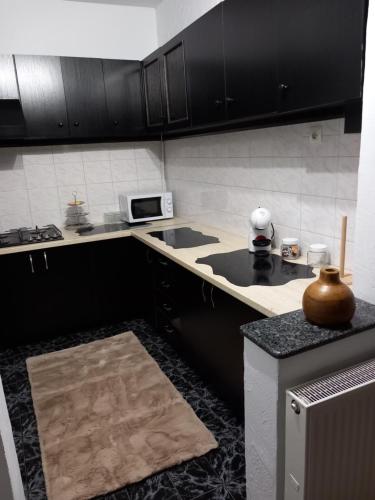 Η κουζίνα ή μικρή κουζίνα στο Central apartament
