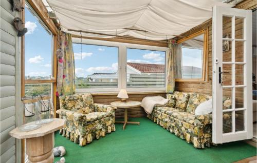 a room with a couch and chairs and windows at Lovely Home In Hejls With Wifi in Hejls
