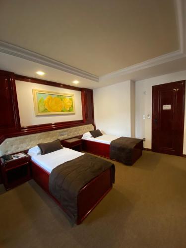 Katil atau katil-katil dalam bilik di Maxim Plaza Hotel