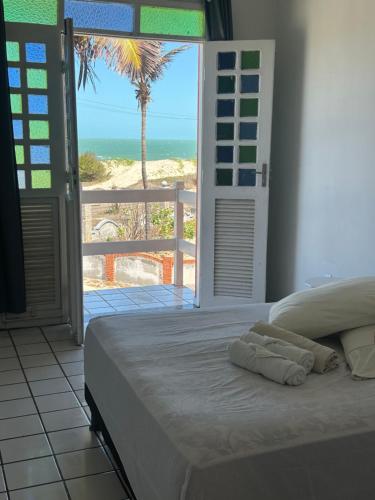 Postel nebo postele na pokoji v ubytování Paraiso frente ao mar, réplica grega Edificio Andros