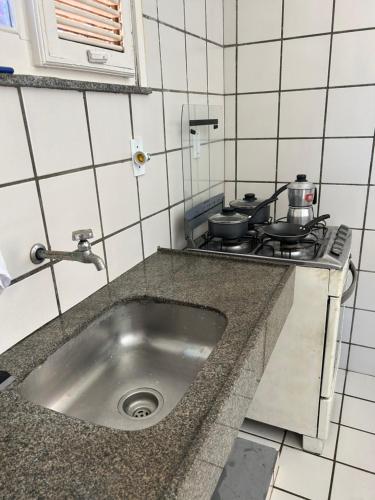 Kuchyň nebo kuchyňský kout v ubytování Paraiso frente ao mar, réplica grega Edificio Andros