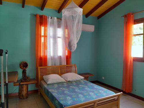 Postel nebo postele na pokoji v ubytování Villa Grand Case