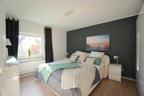 Katil atau katil-katil dalam bilik di Ferienwohnung Krabbe in zentraler Lage von Eckernförde