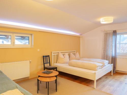 A bed or beds in a room at Rosenberger II