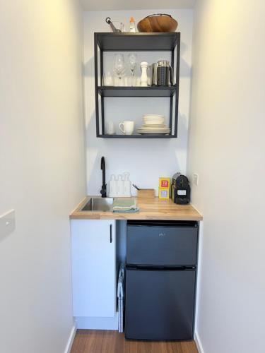 Kuchyň nebo kuchyňský kout v ubytování Torquay Boutique Guesthouse