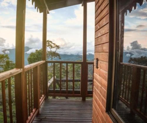 a view from the porch of a cabin at Glamping la Joyita in Chimbe