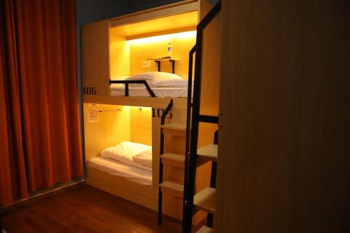 Katil atau katil-katil dalam bilik di Danshe Hostel
