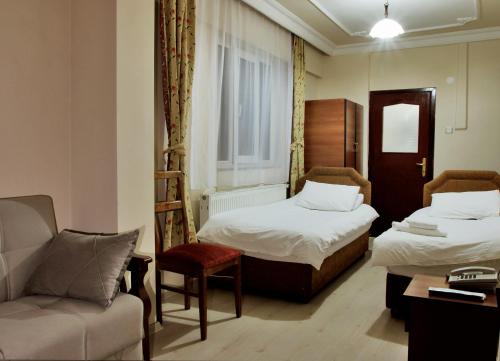 Krevet ili kreveti u jedinici u objektu Yavuzlar Hotel
