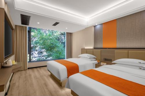Postel nebo postele na pokoji v ubytování So Easy Hotel