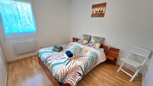 Ένα ή περισσότερα κρεβάτια σε δωμάτιο στο Appartement 1 Chambre "Le Carré des Antilles"