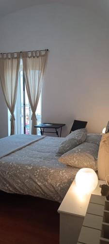 Postel nebo postele na pokoji v ubytování Velia's Home Casa Vacanze B&b