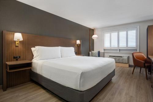 Cama o camas de una habitación en Holiday Inn Hotel & Suites St.Catharines-Niagara by IHG