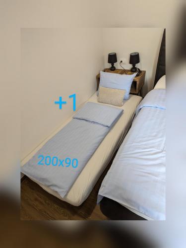 Katil atau katil-katil dalam bilik di MY TIME Holiday House with sauna