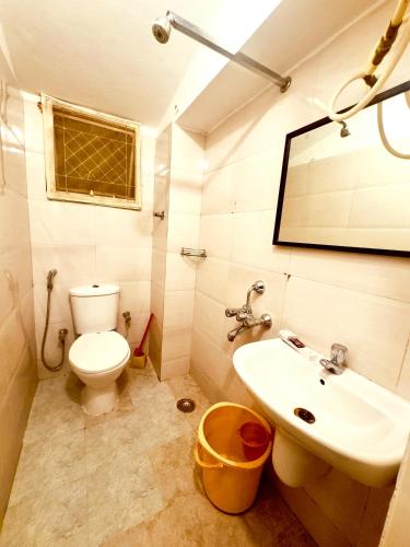 Ένα μπάνιο στο Cosy Banjara Guest House