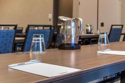 a trophy sitting on top of a wooden table at Cambria Hotel Phoenix Chandler - Fashion Center in Chandler