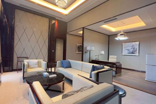 Area soggiorno di Wyndham Grand Tongren Downtown Hotel
