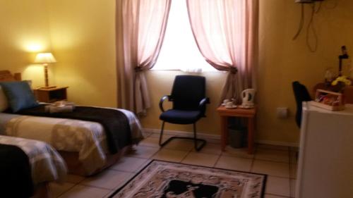 Katil atau katil-katil dalam bilik di The Old Mill Hotel