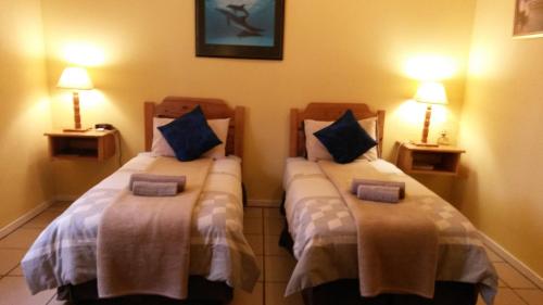Katil atau katil-katil dalam bilik di The Old Mill Hotel