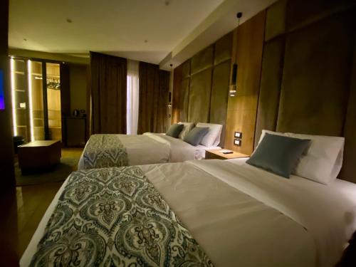 a hotel room with two beds at New Museum Guest House, Pyramids View in Cairo