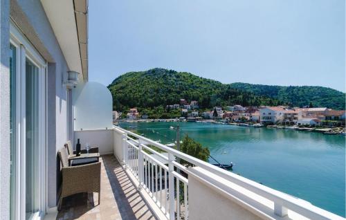 a balcony with a view of a body of water at Apartment Blace With Sea View Xii in Blace