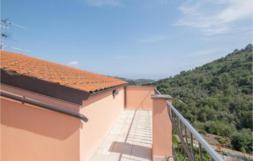 a balcony with a view of a mountain at 2 Bedroom Nice Home In Borgo D'oneglia in Borgo dʼOneglia