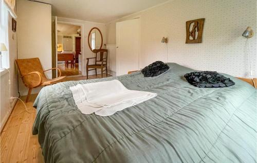 Katil atau katil-katil dalam bilik di 3 Bedroom Gorgeous Home In Överlida