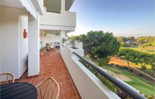a balcony with a view of a yard at 2 Bedroom Lovely Apartment In Marbella in Marbella