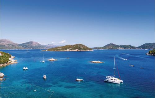 a group of boats in a large body of water at Six-Bedroom Holiday Home In Sipan in Suđurađ