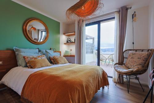 Postel nebo postele na pokoji v ubytování chambre d'hote luxe vue mer boheme