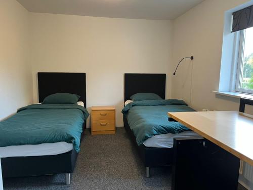 Una cama o camas en una habitación de Comfortable Apartment in Birkerød