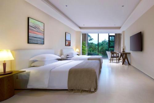 Φωτογραφία από το άλμπουμ του Star Paddy Fields Resort σε Lingshui