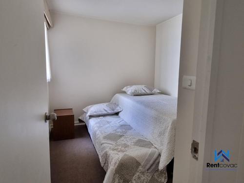 Postel nebo postele na pokoji v ubytování Departamento Corporativo I Talca Norte - RENTCOVAC - Factura Inmediata