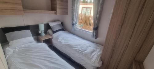 Postel nebo postele na pokoji v ubytování swift LOIRE