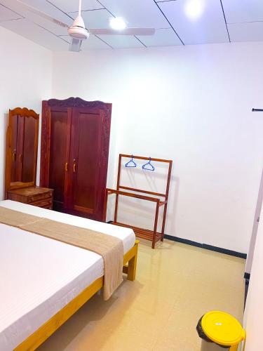 Ένα ή περισσότερα κρεβάτια σε δωμάτιο στο Mangrove Bay Inn