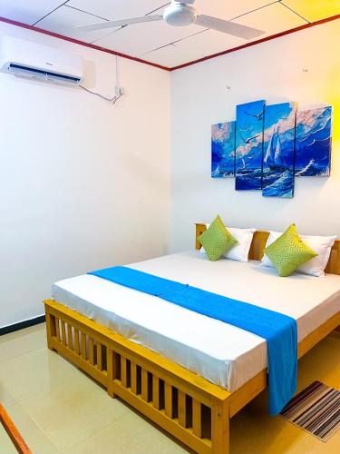 Ένα ή περισσότερα κρεβάτια σε δωμάτιο στο Mangrove Bay Inn