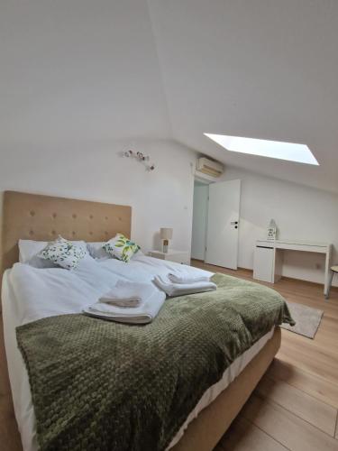 Ένα ή περισσότερα κρεβάτια σε δωμάτιο στο Casa Sava - ultracentral