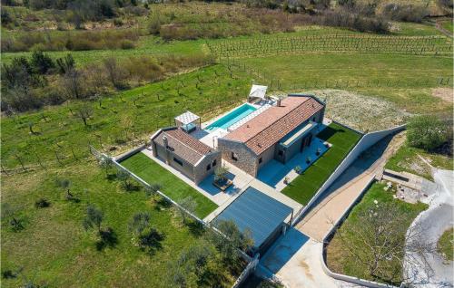 an overhead view of a house with a swimming pool at Villa Noeli in Hum