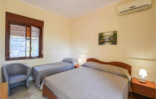 Ένα ή περισσότερα κρεβάτια σε δωμάτιο στο Awesome Home In Siracusa