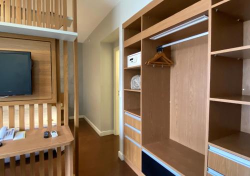 Ένα ή περισσότερα κρεβάτια σε δωμάτιο στο lindo flat no mercure