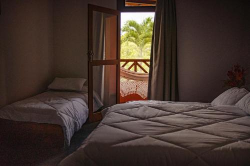Ένα ή περισσότερα κρεβάτια σε δωμάτιο στο Hotel Vale do Jiquiriçá