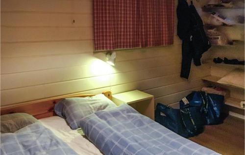 Katil atau katil-katil dalam bilik di 4 Bedroom Cozy Home In Stavang