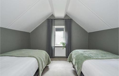 Katil atau katil-katil dalam bilik di 3 Bedroom Stunning Home In Kerkdriel