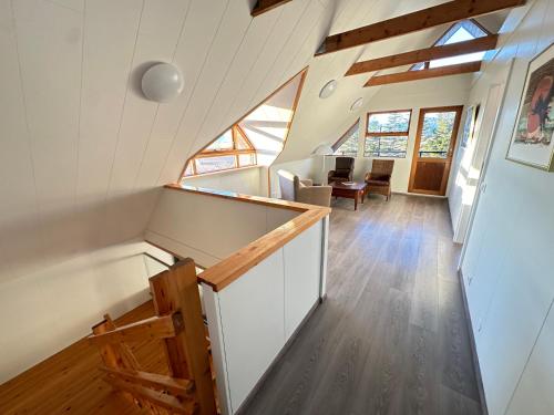 an overhead view of a tiny house with a staircase at Lodge Borgarbrekka in Lón South East of Iceland - Birta Rentals in Höfn