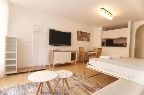 TV a/nebo společenská místnost v ubytování Lorez 5A by Arosa Holiday