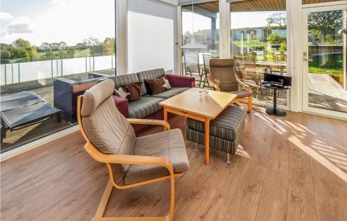 Posezení v ubytování Holiday Home Harbokobbel