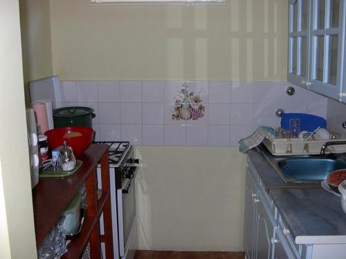 Cuisine ou kitchenette dans l'établissement Babarczi Üdülőház