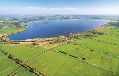 an aerial view of a large lake in a field at Gorgeous Home In Lembruchdümmer See in Lembruch