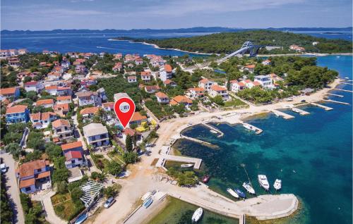an aerial view of a small island in the water at Nice Home In Zdrelac With Sauna in Ždrelac